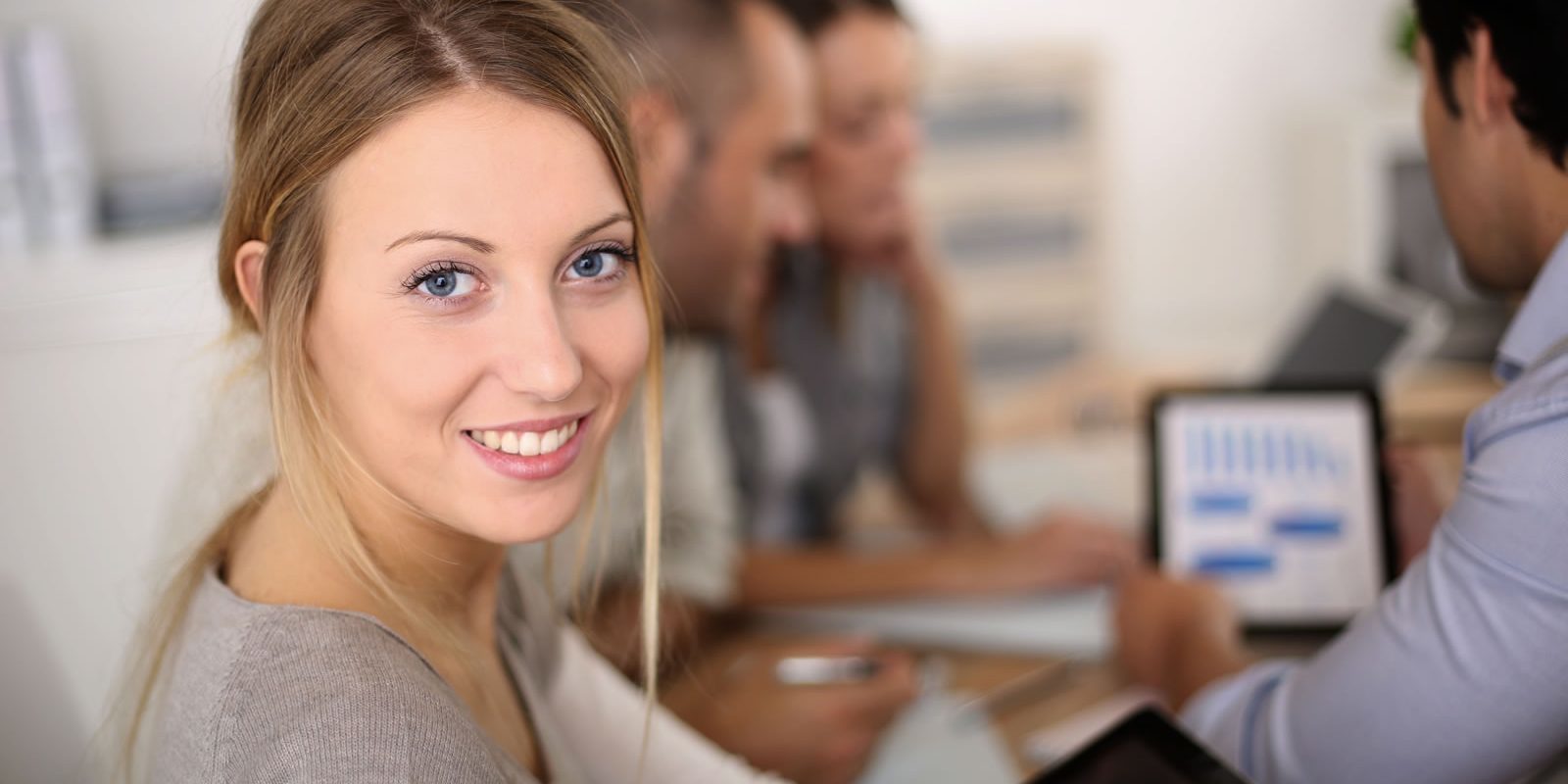young saleswoman looking at camera